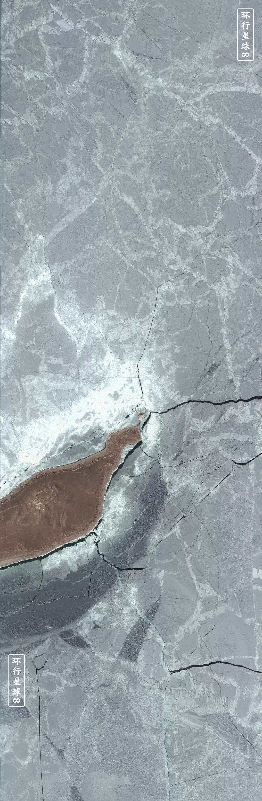 青海湖的冰面以海心山为中心渐渐裂开